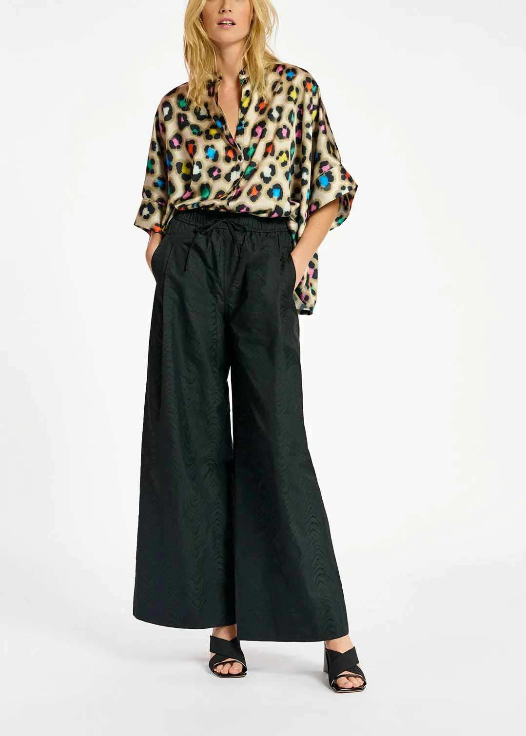 Beige oversized shirt with multicolor leopard print