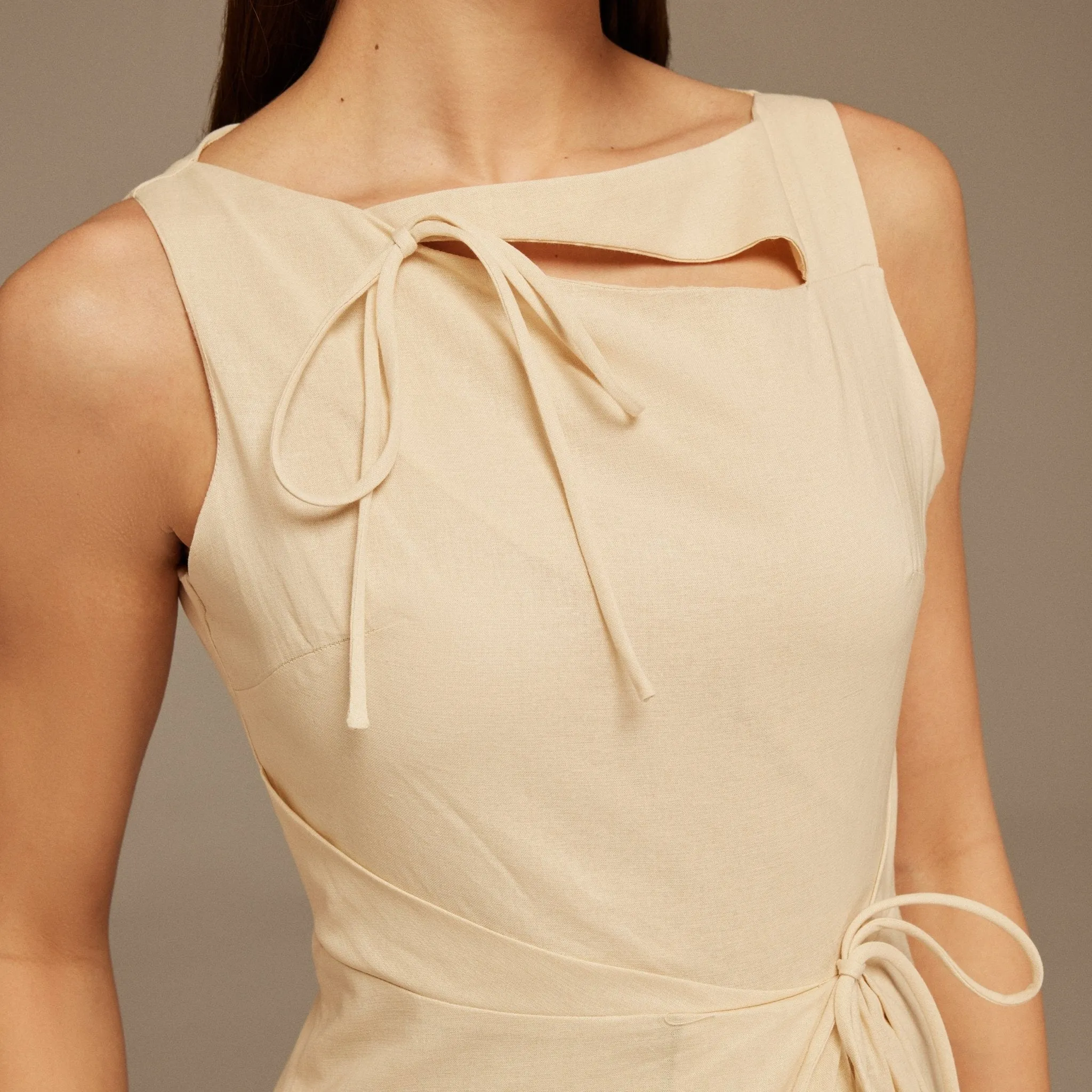 Beige Sleeveless Midi Dress With Decorative Bows