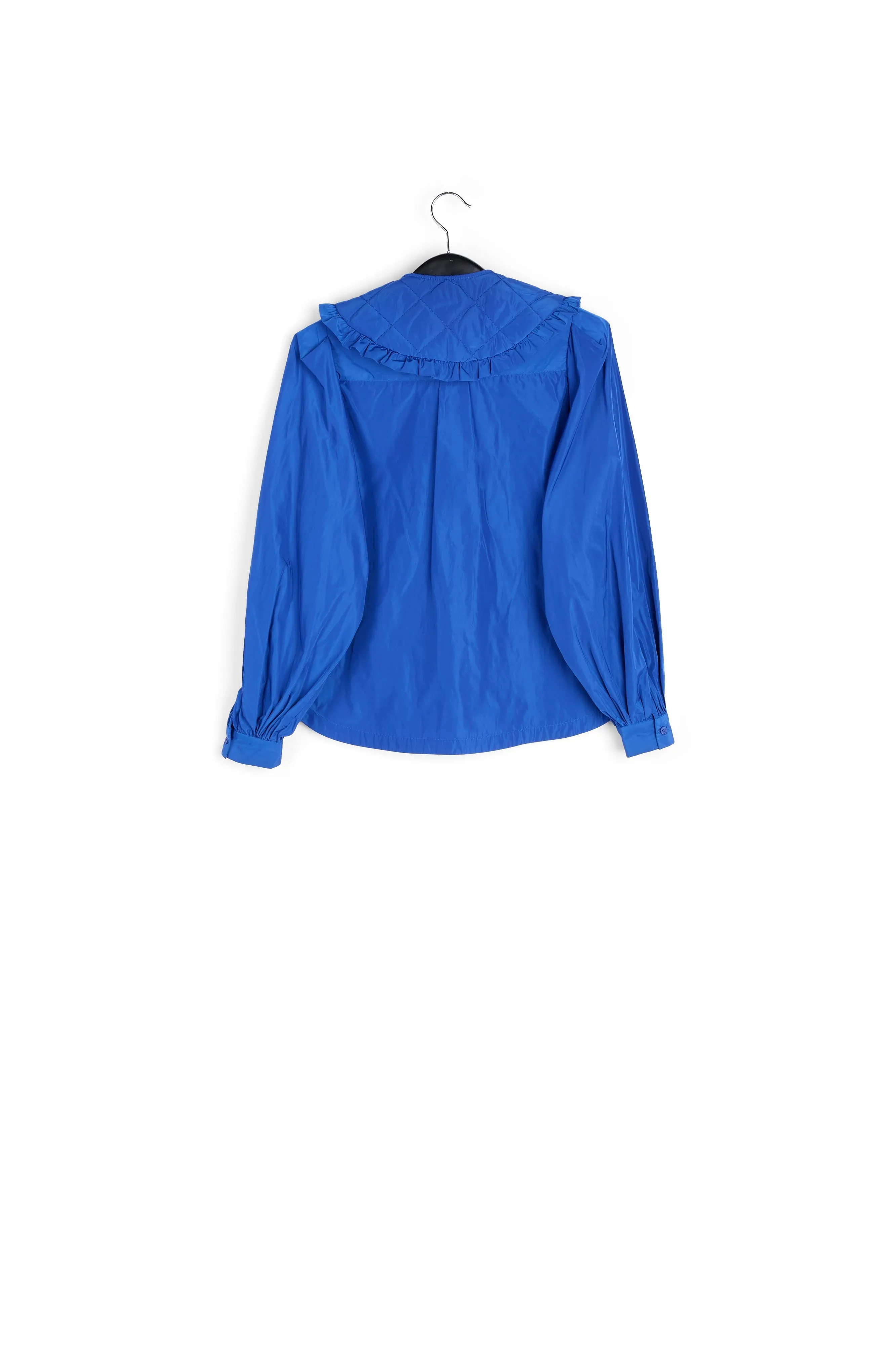 Blue puffed-sleeve top