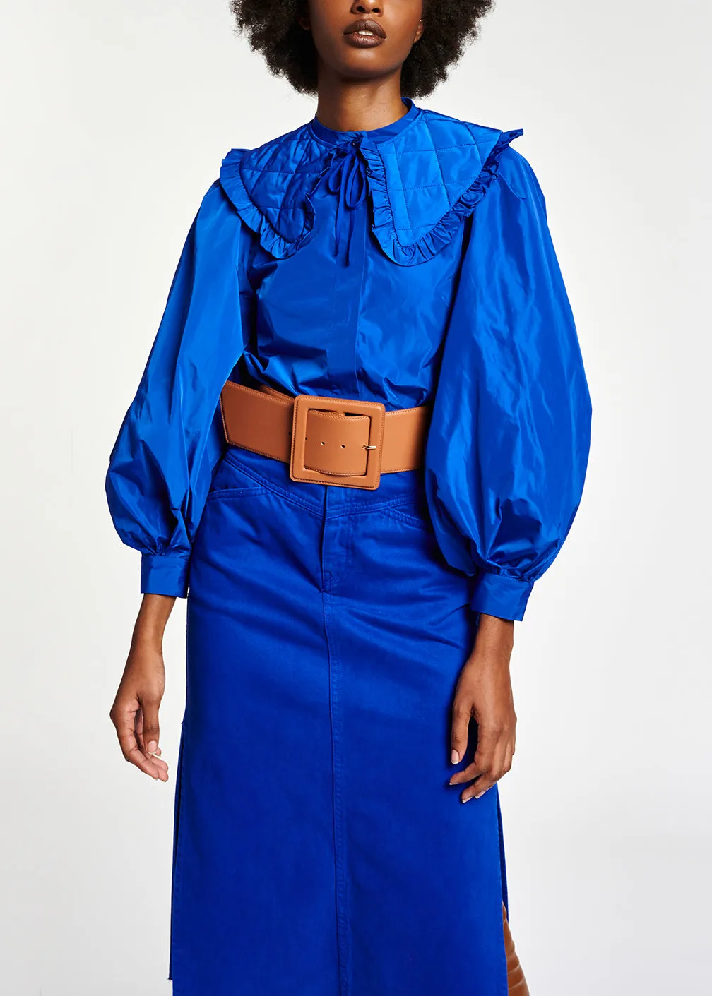 Blue puffed-sleeve top