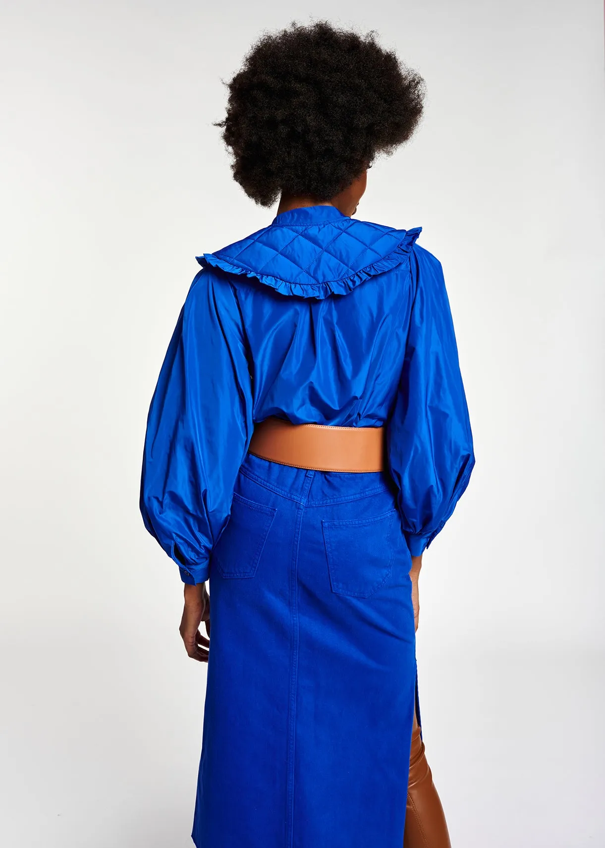 Blue puffed-sleeve top