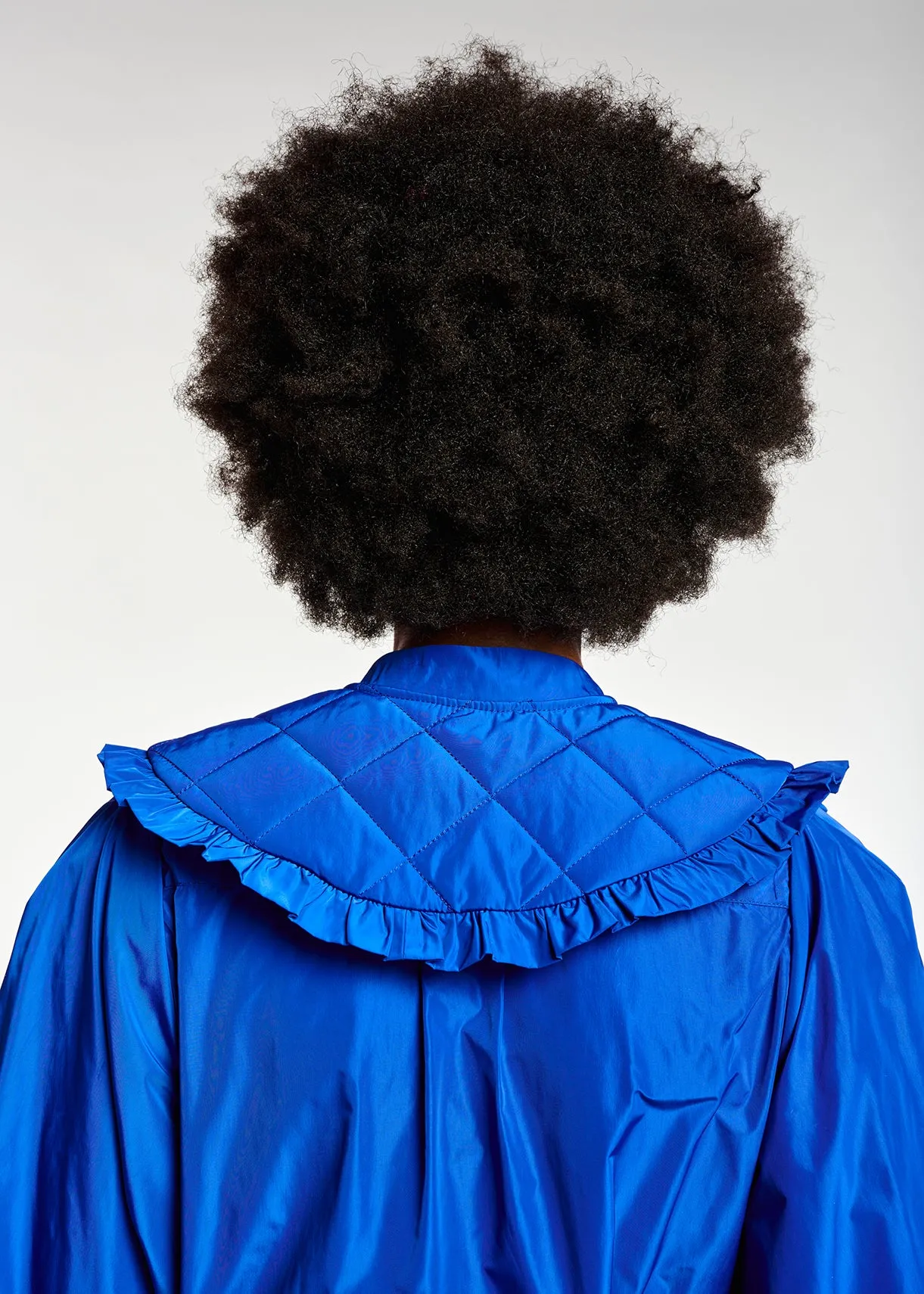 Blue puffed-sleeve top