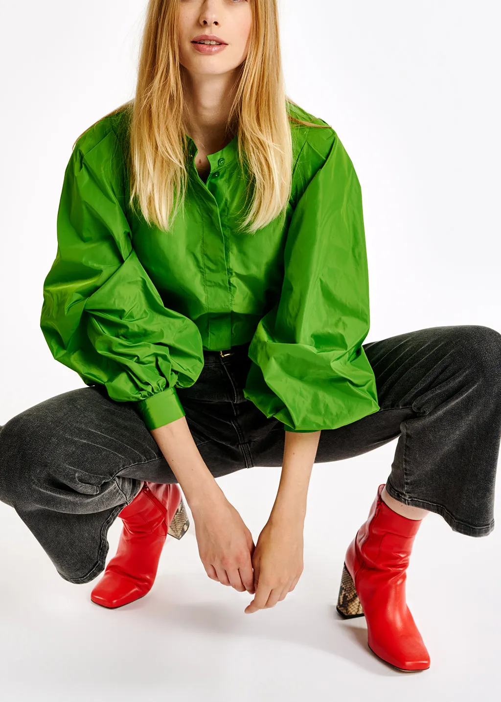 Green puffed-sleeve top