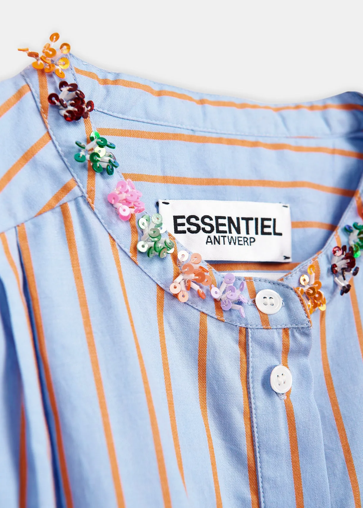 Light blue and orange striped cotton shirt with bead embellishments