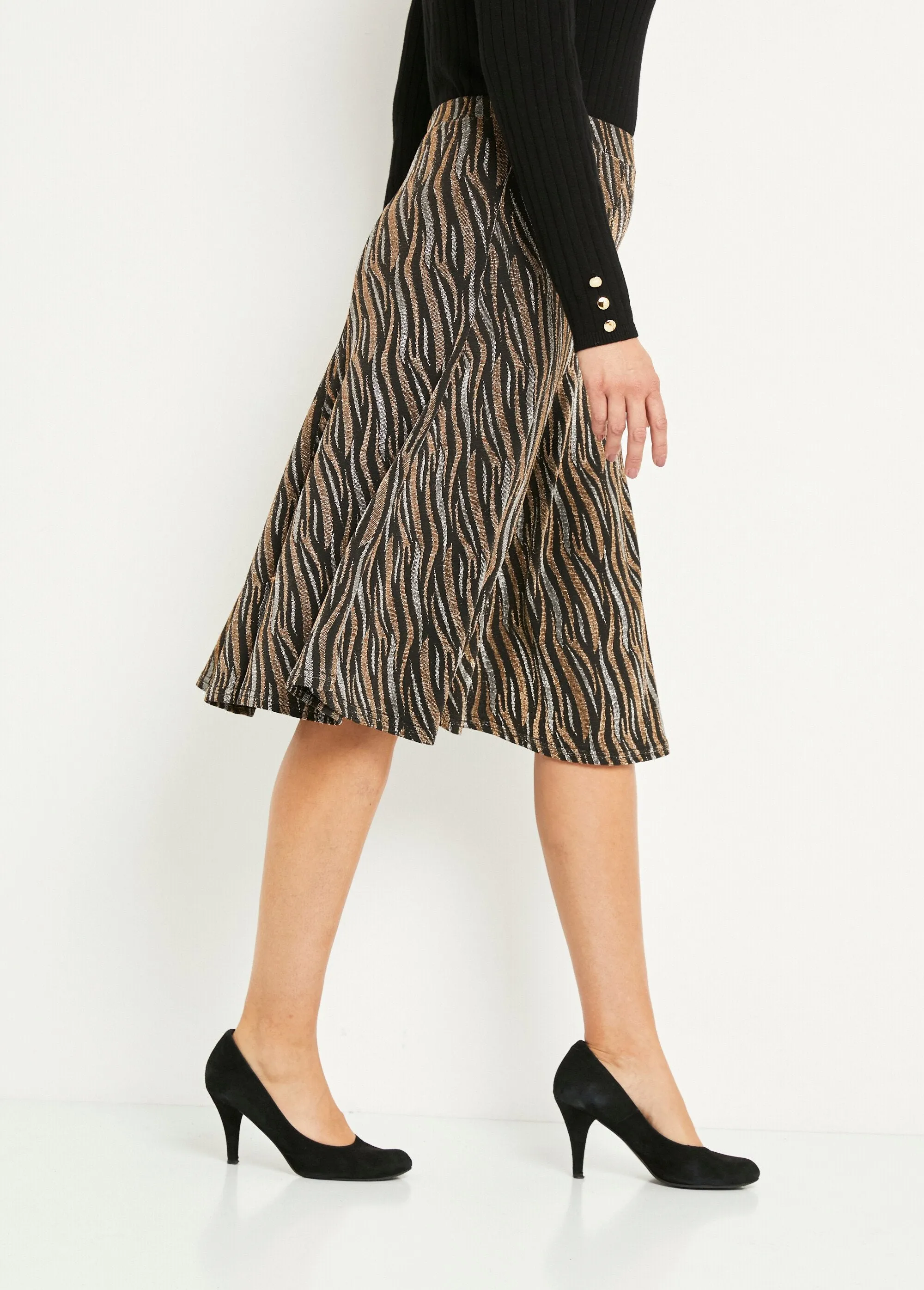 Mid-length flared skirt in shiny jacquard knit