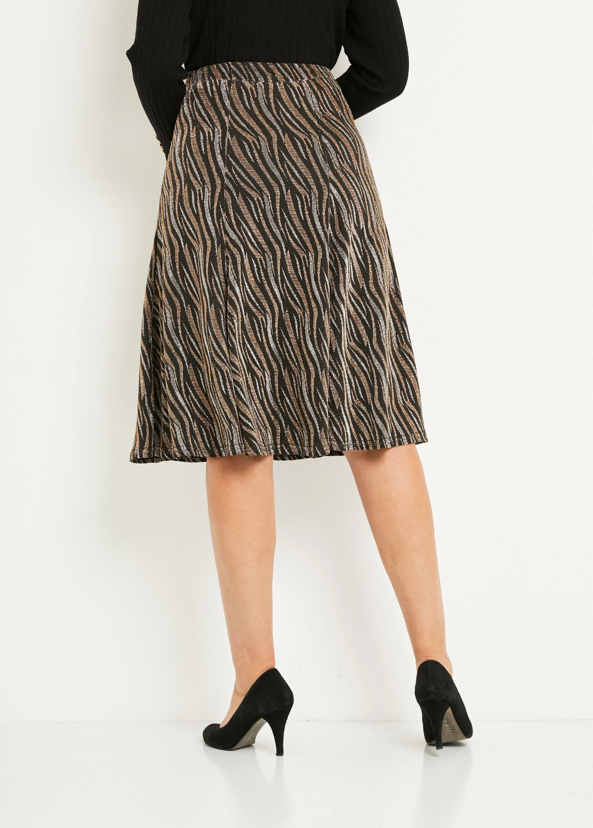 Mid-length flared skirt in shiny jacquard knit