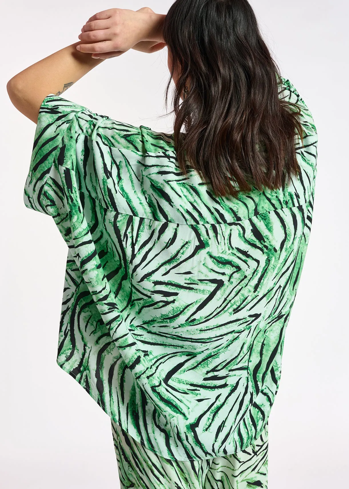 Mint green oversized top with tiger motif