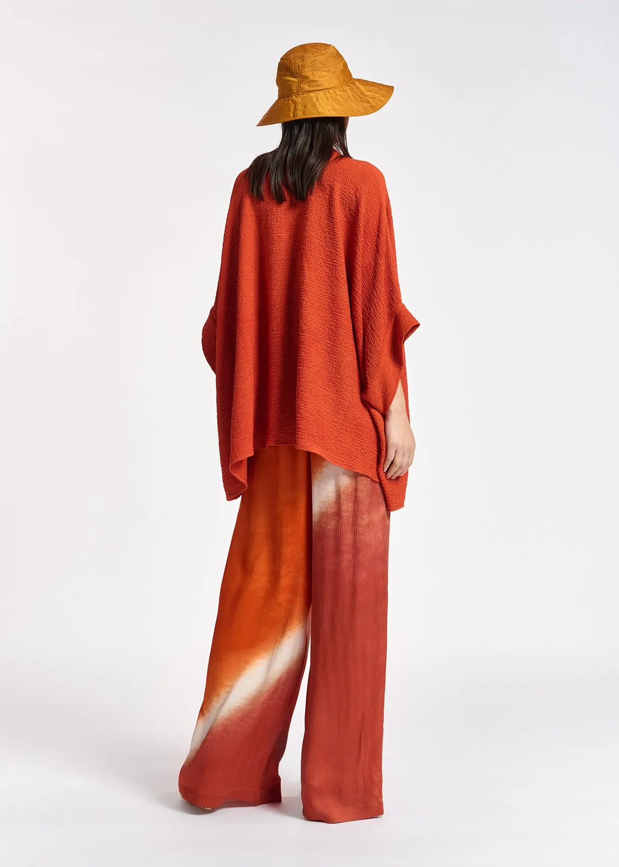 Orange boxy-cut seersucker shirt