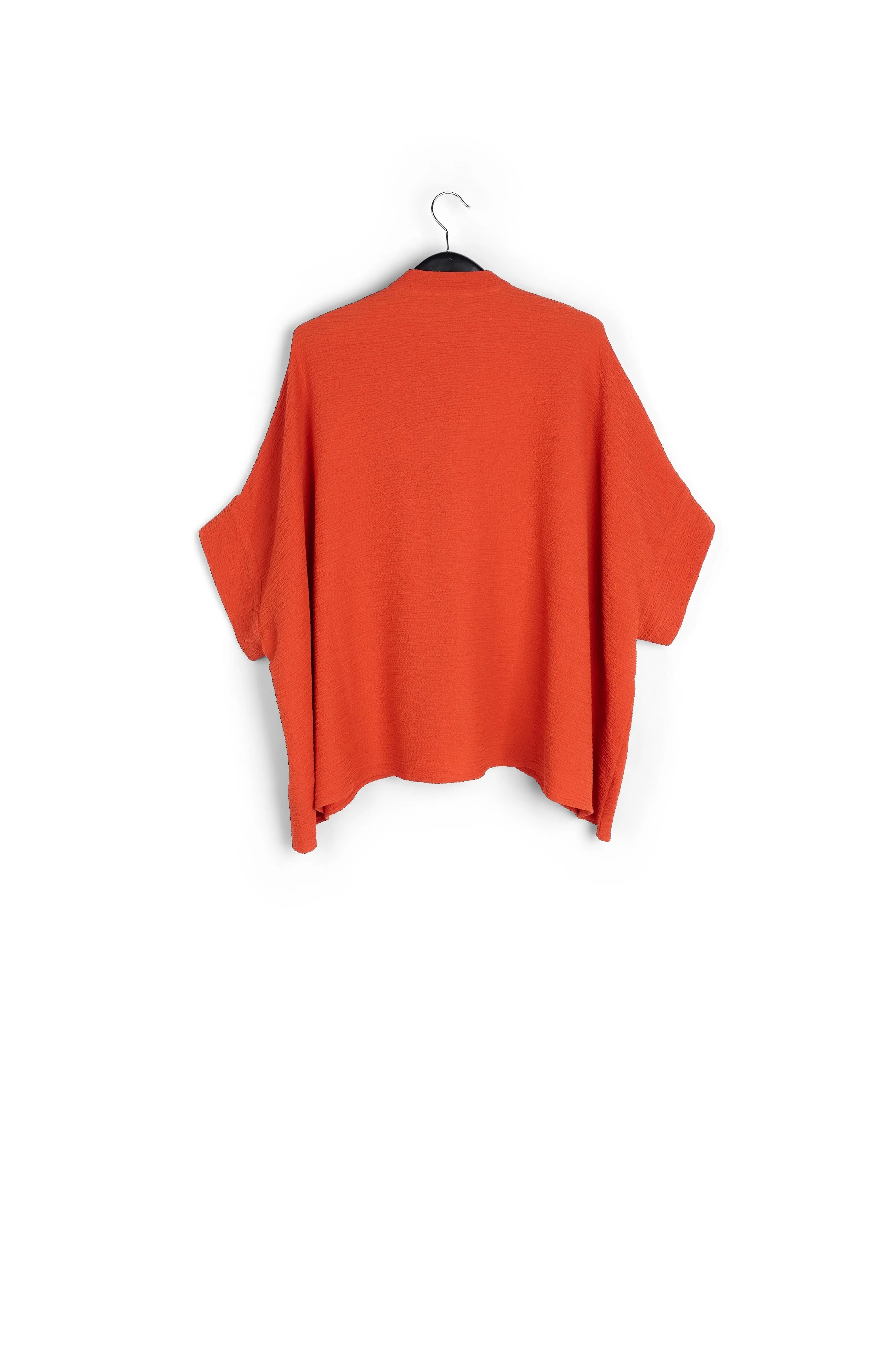 Orange boxy-cut seersucker shirt
