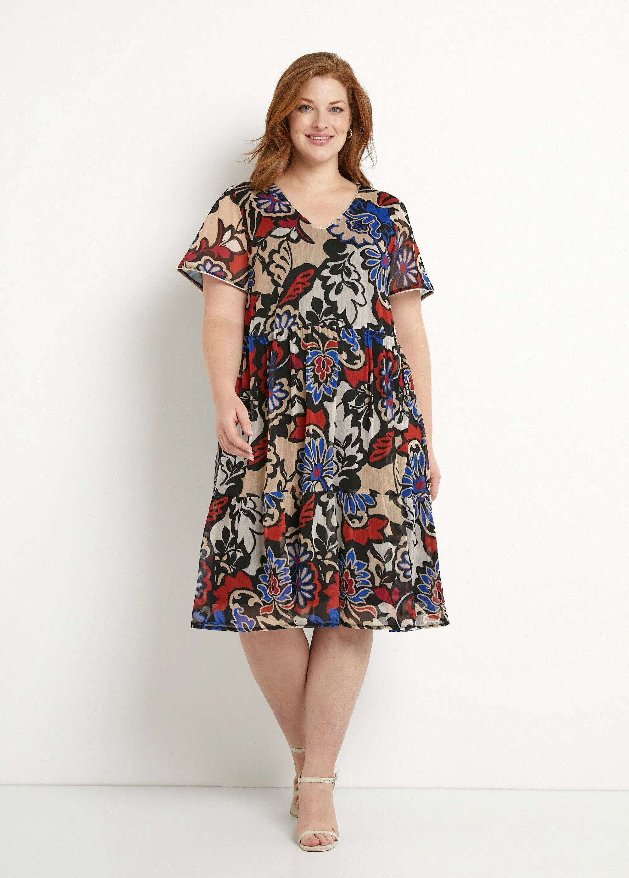 Short flared dress with ruffled printed voile