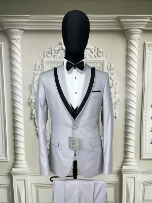 Single button three piece men's Suit with contrasting black velvet lapel, matching bow tie and Black Pants