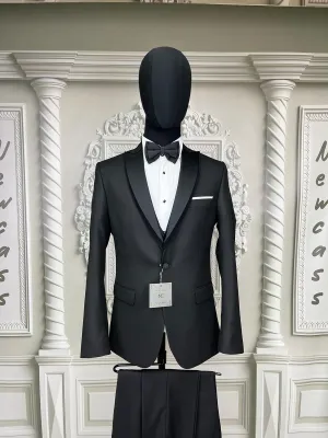 Single Button Three Pieces Tuxedo Suit with Contrasting Black Satin Lapel, matching bow tie and Black Pants.
